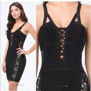 BEBE Spandex Open Lace Sides Criss Cross Bodice Black Mini Dress Size SP NWT